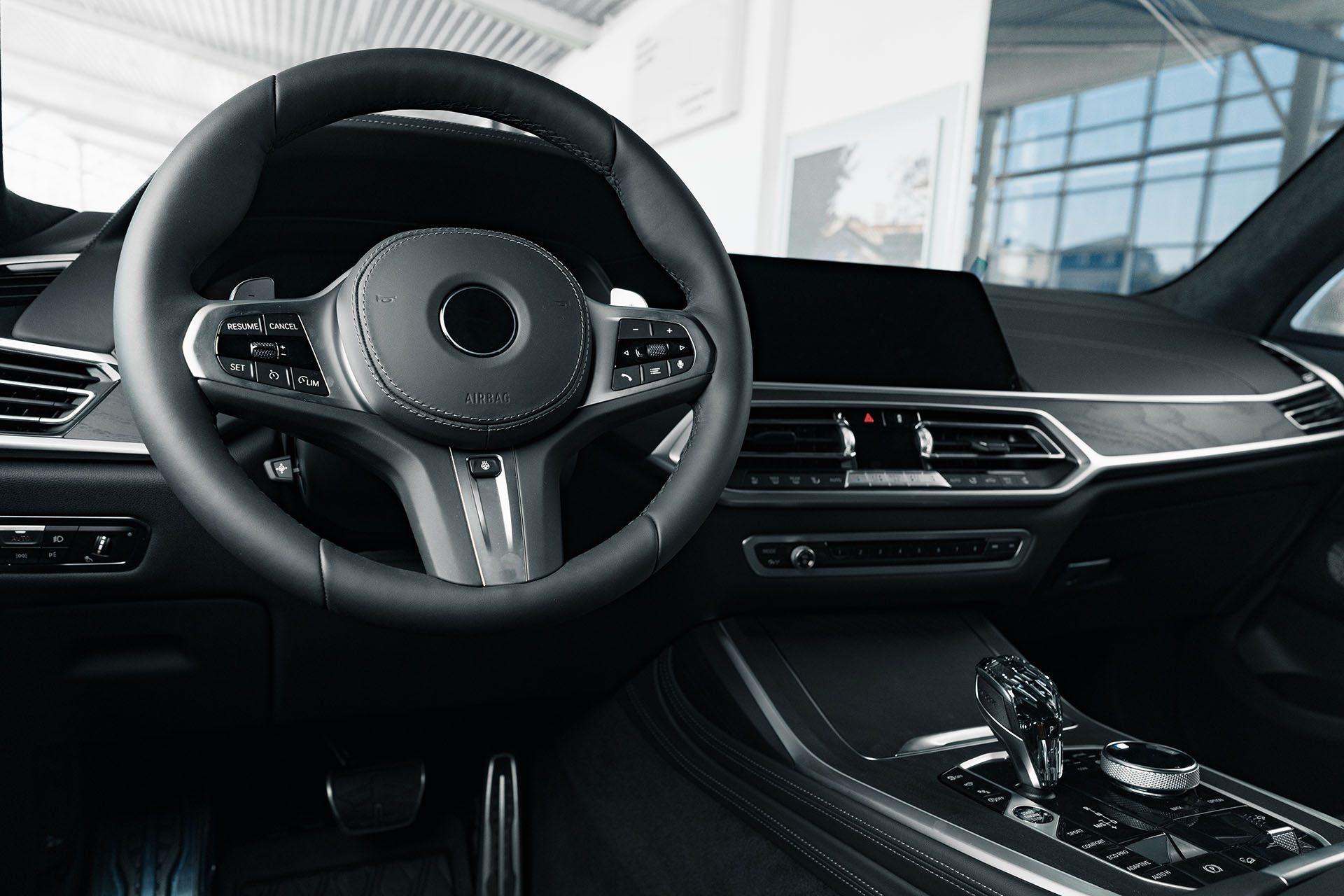 steering-wheel-of-a-new-luxury-car-2021-12-09-11-42-08-utc